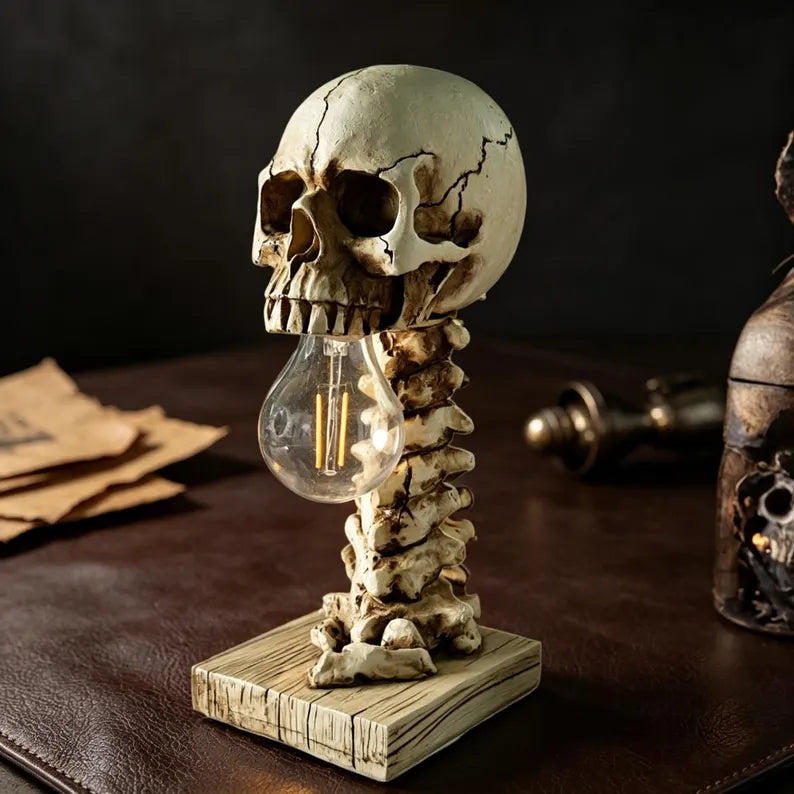 Hero shot of the gothic skull spine lamp in dark ambient setting