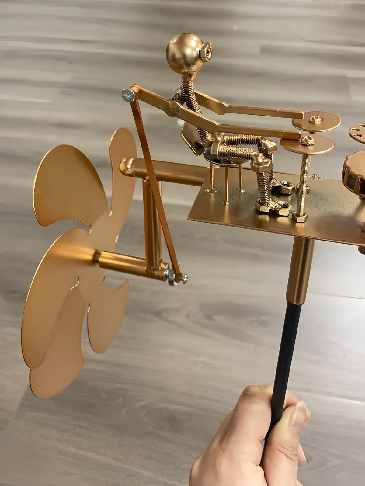 Wind-Powered Metal Drummer Garden Windmill