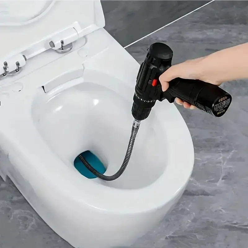 Cordless drill connected to flexible drain cleaning snake