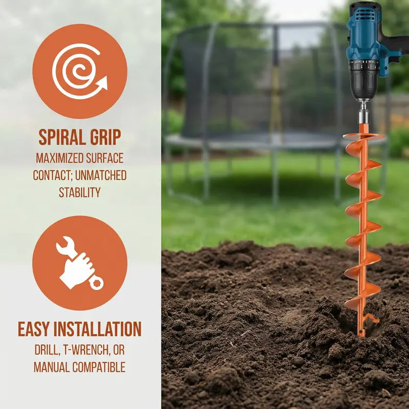 Close-up of a drill driving the orange powder-coated steel spiral ground anchor into soil with a trampoline in the background
