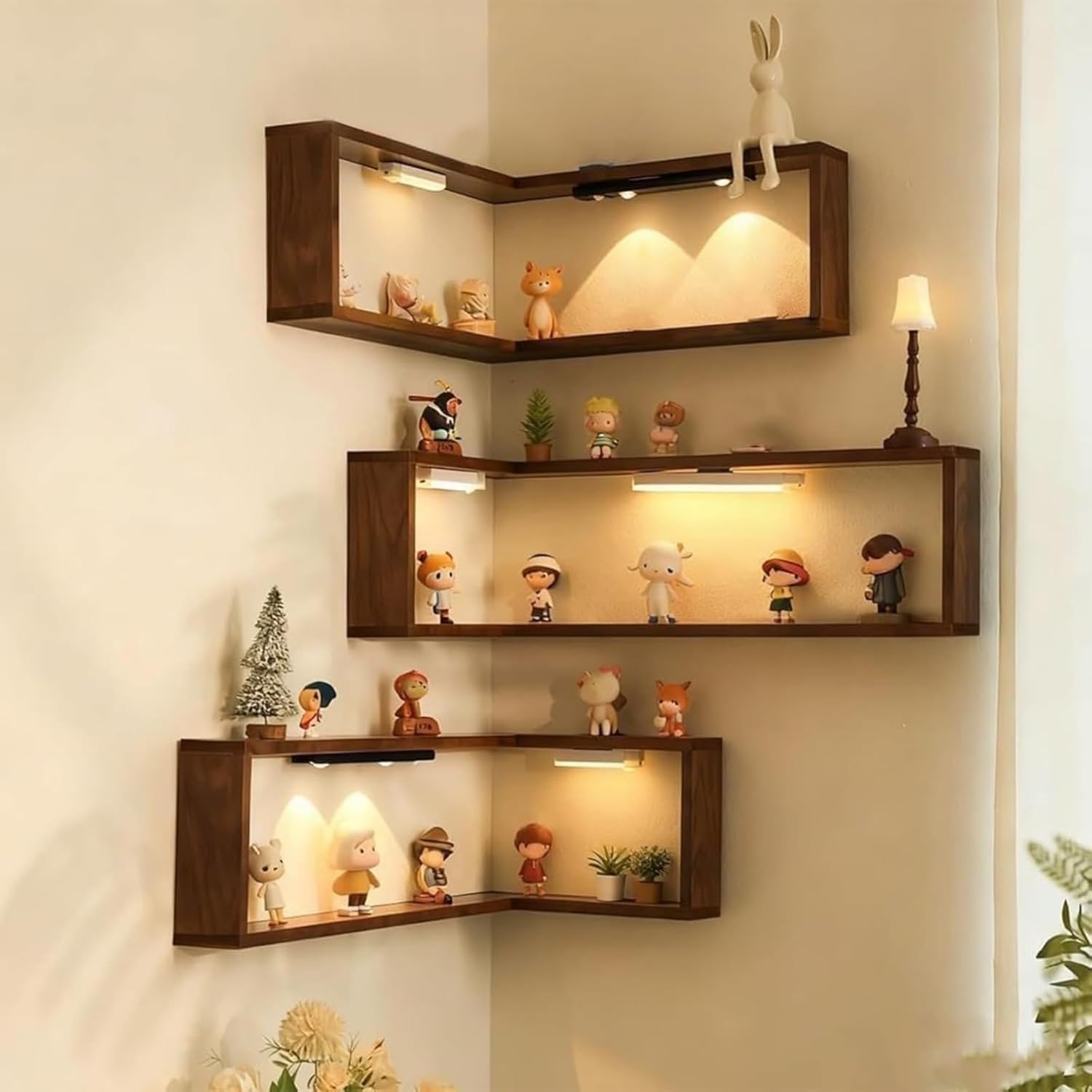 Illuminated corner wall shelves displaying collectibles