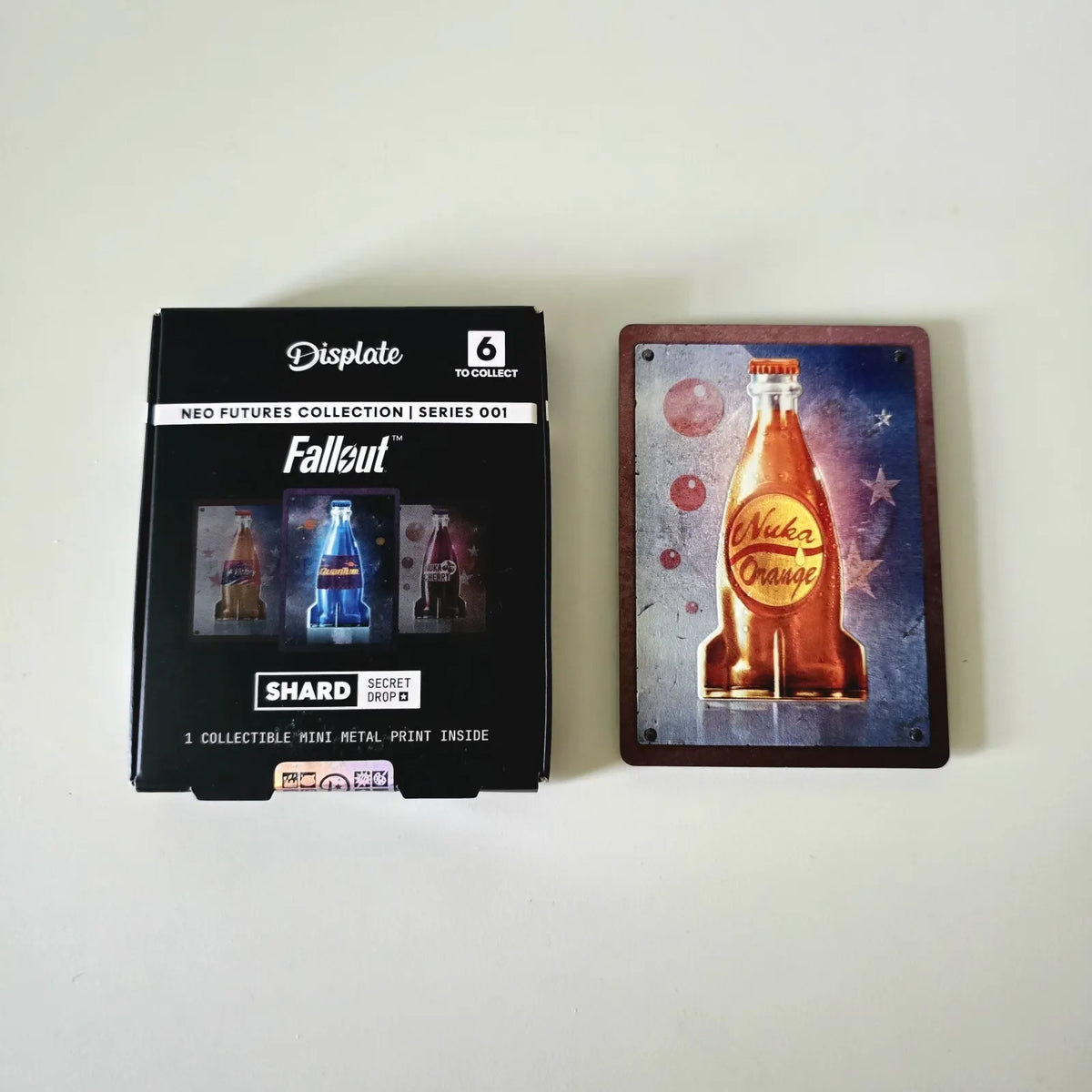 Displate Shard Secret Drop Series 1 - Fallout Nuka Orange
