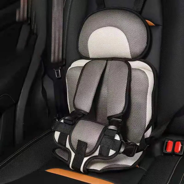 Beige and gray foldable child travel support seat