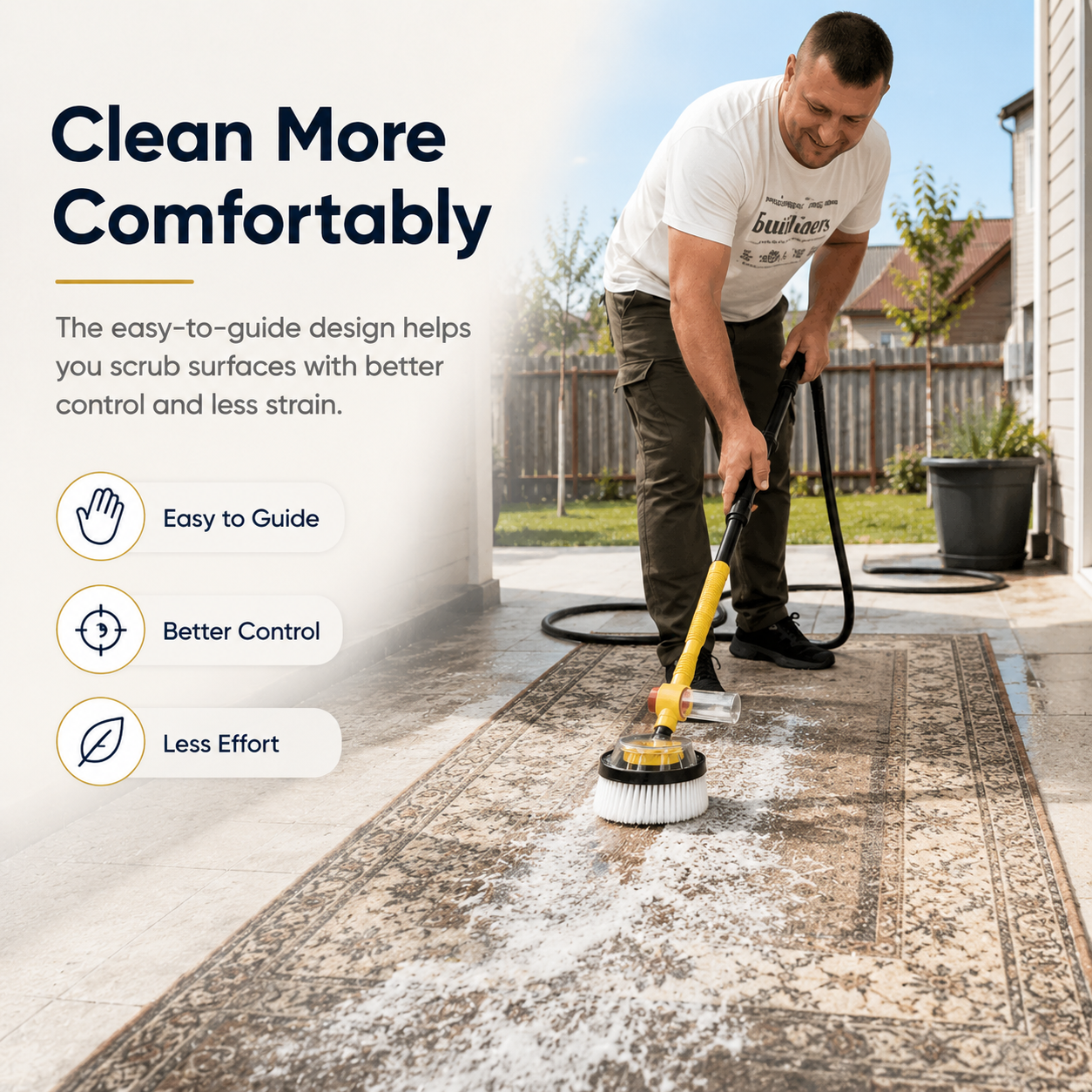 Man comfortably guiding a long handle scrub brush over an outdoor rug