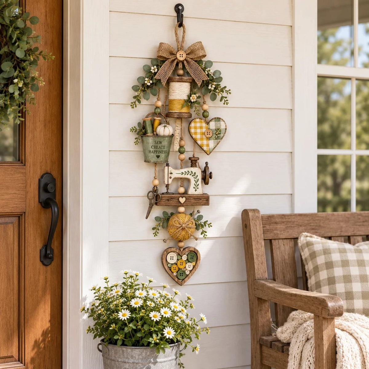 Rustic sewing themed hanging ornament displayed beside a farmhouse porch door