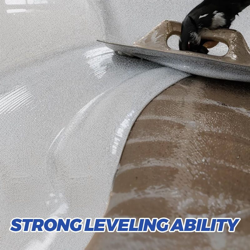 Close-up of a tool spreading wet self-leveling gray epoxy coating across a floor
