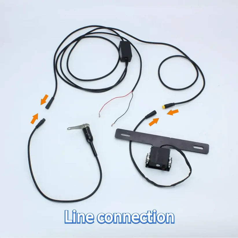 Motorized motorcycle plate bracket wiring harness overview