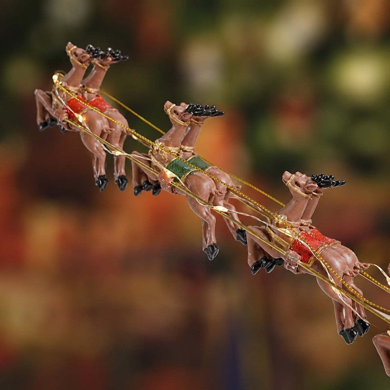 🎅 Lighted Santa Sleigh & Flying Reindeer Figurine – Warm LED Christmas Decor