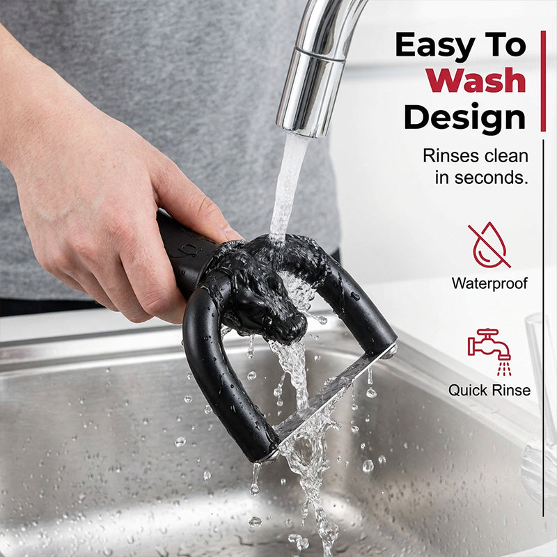 Handheld fat trimmer rinsed under running water